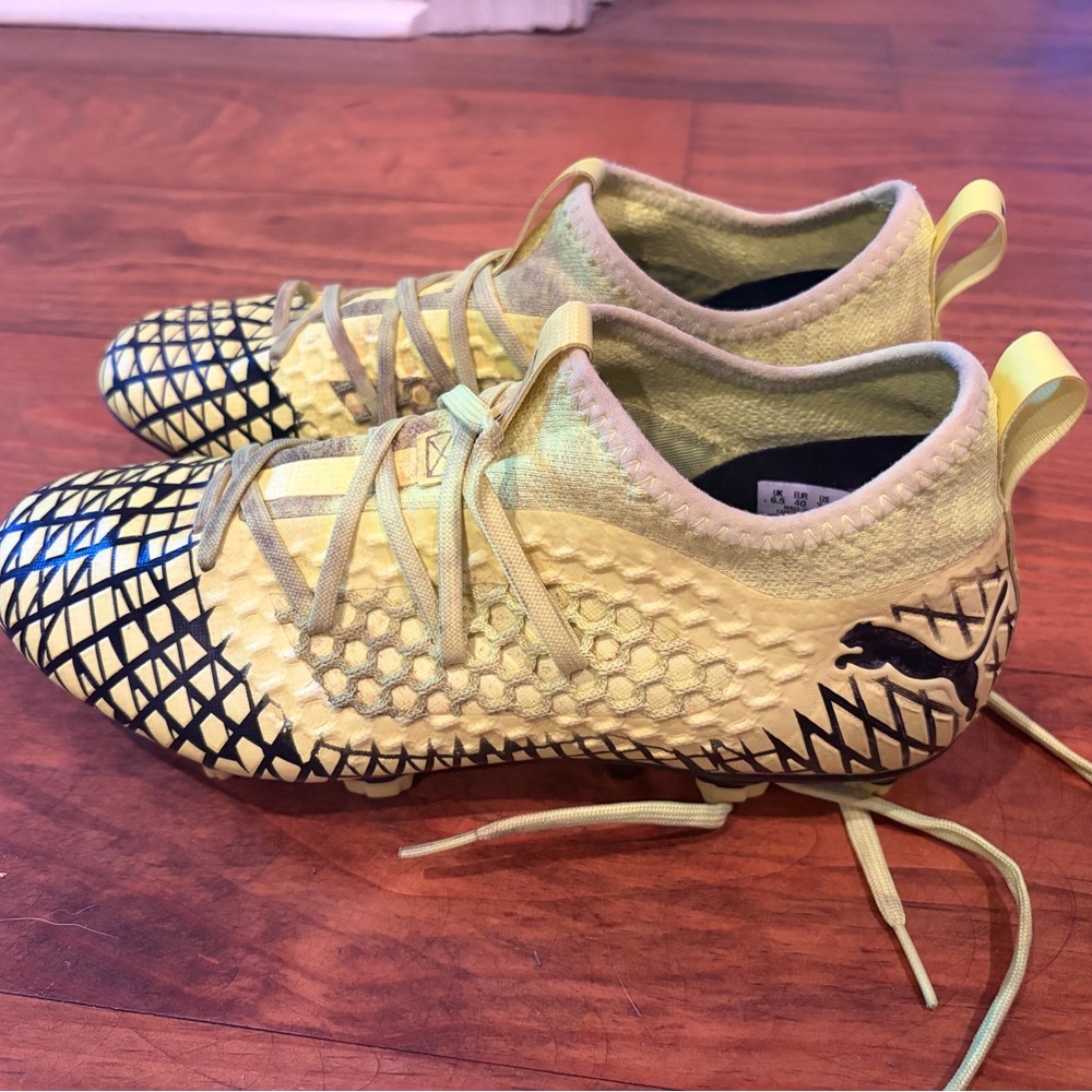 PUMA KIDS FUTURE 4.1 NETFIT FG/AG - YELLOW ALERT/PUMA BLACK